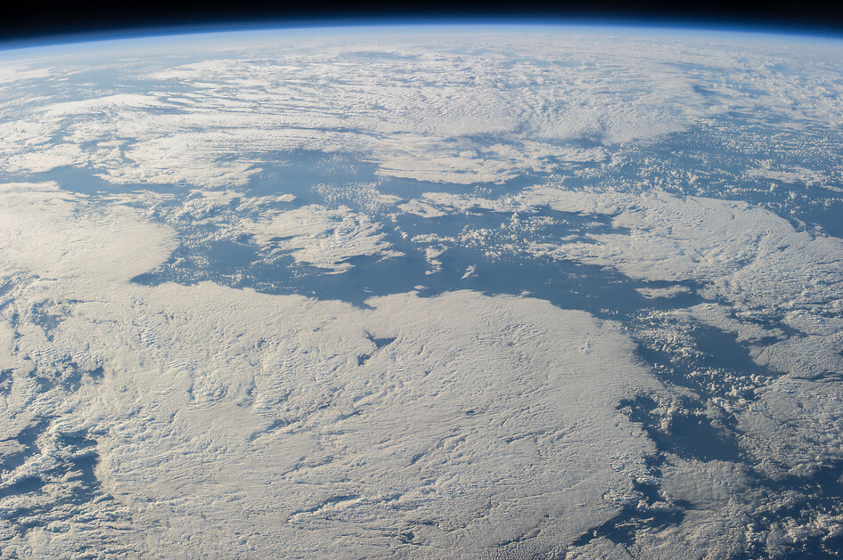 A cloud-covered part of Earth, photographed by an Expedition 40 crew member on the International Space Station.